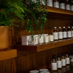 Aromatherapy oils lined up on a shelf