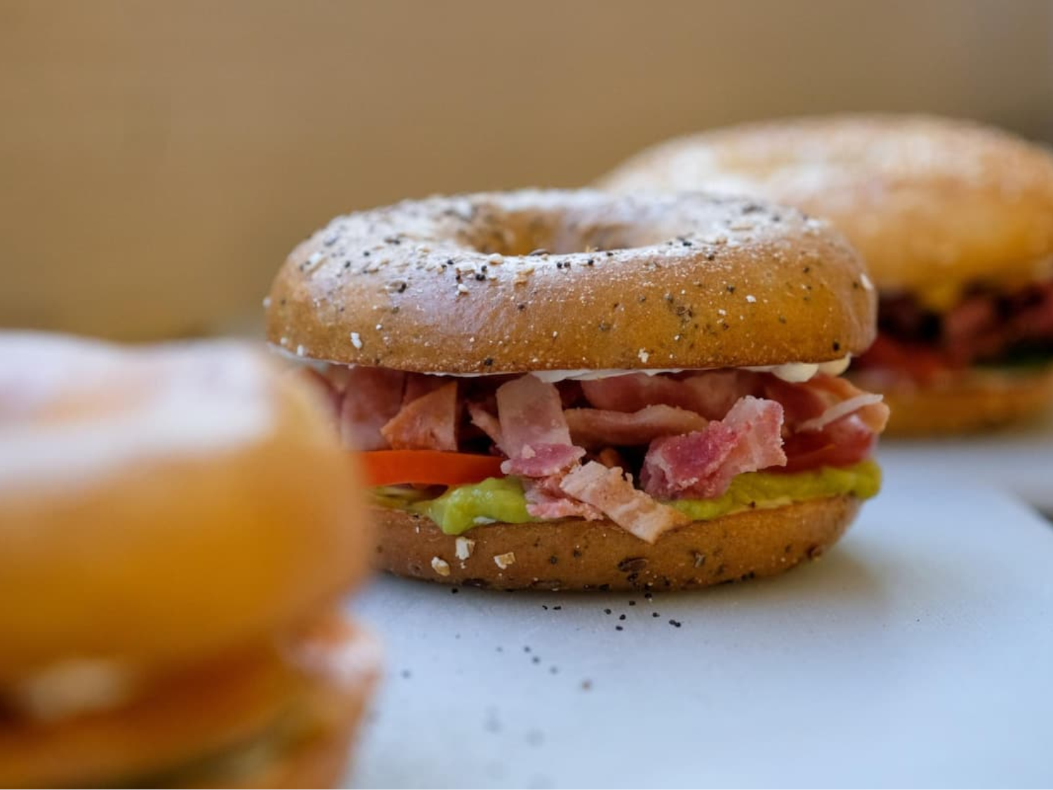 Three filled bagels.