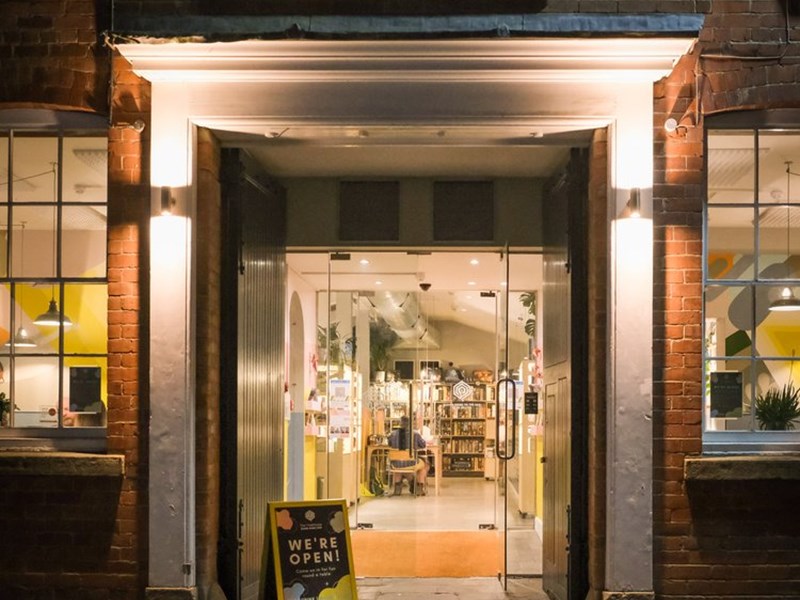 The entrance to The Treehouse Cafe, at night.