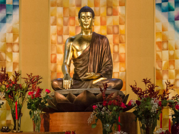 A gold statue of the Buddha.