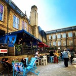 Seating in Leopold Square outside the Bamboo Door.