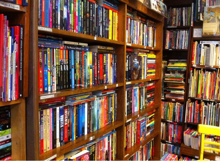 Several bookcases full of books.