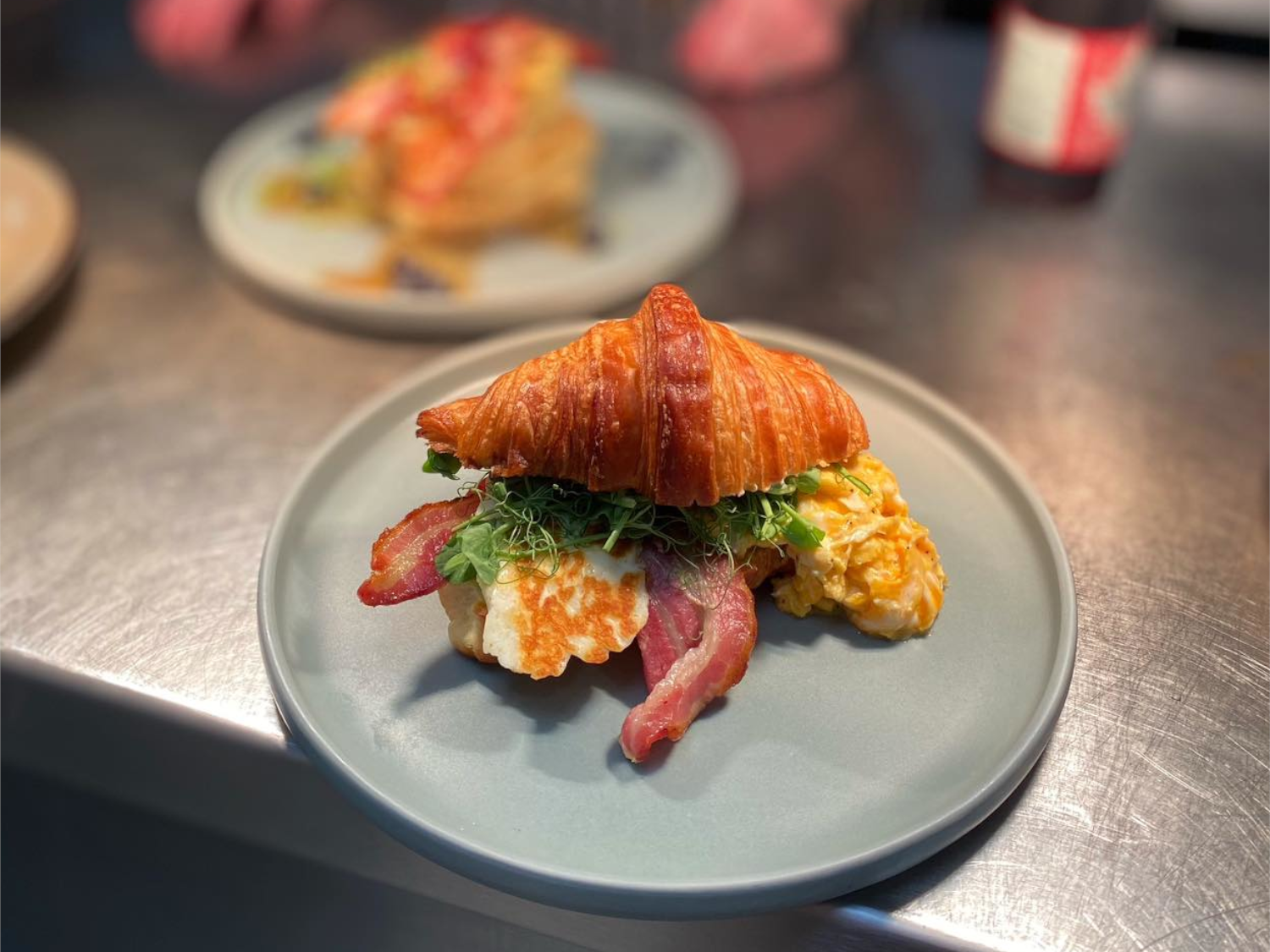 Breakfast sandwich in a croissant at Kollective Kitchen - Nether Edge