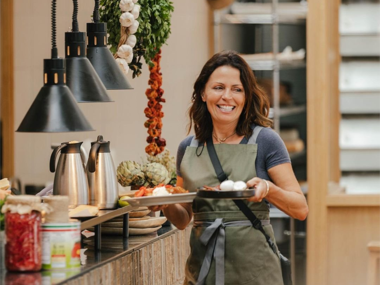 Food being carried to a table at Marmadukes - The Sorting Office