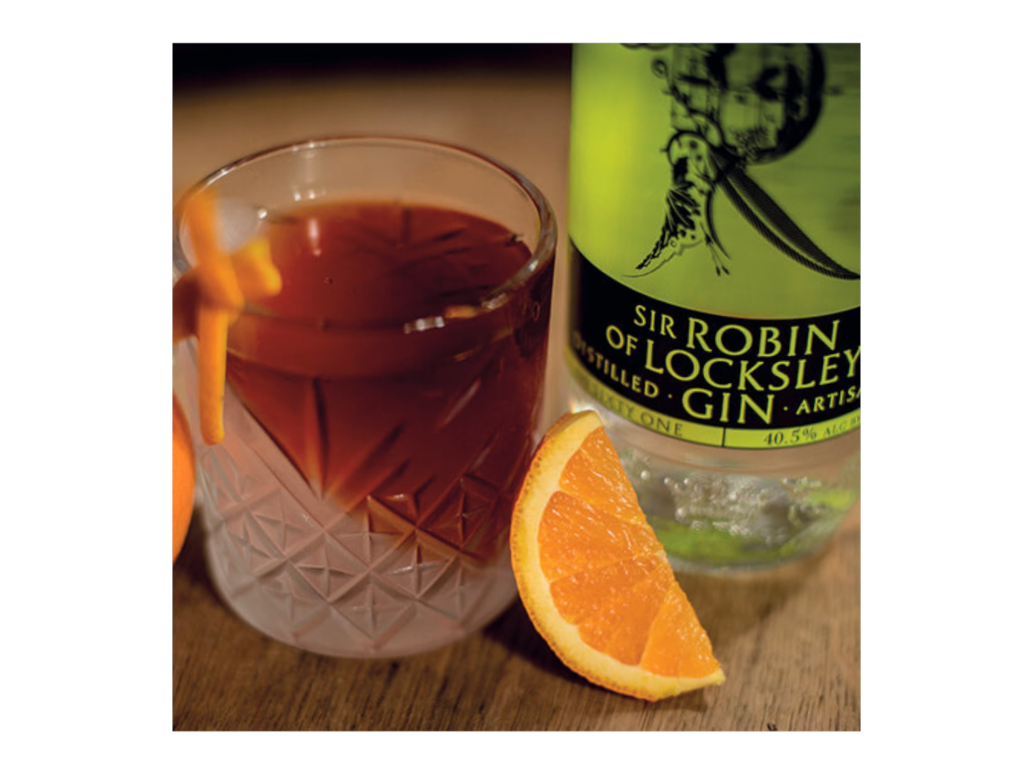A cocktails and a bottle of Locksley Distilling Co gin.