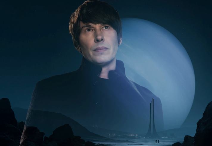 A dark, futuristic landscape with rocky terrain in the foreground and a towering structure in the distance. Behind the structure is a massive planet with a glowing blue hue, dominating the night sky. The scene has a sci-fi aesthetic with dramatic lighting and deep shadows.