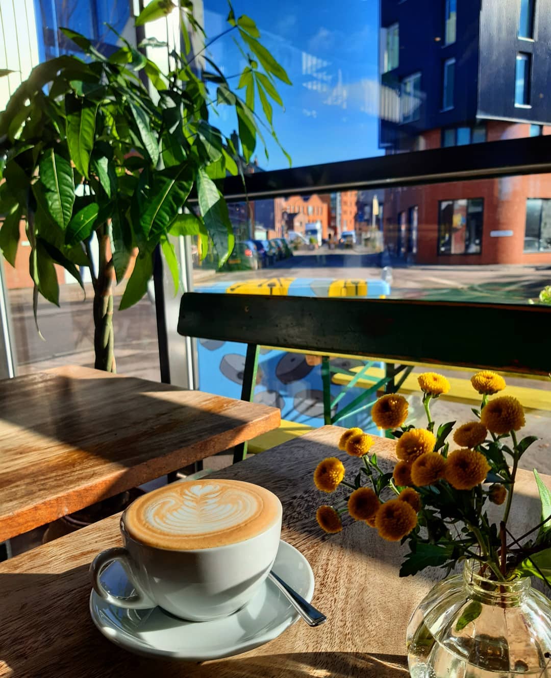 A coffee on a table at The Grind Café.