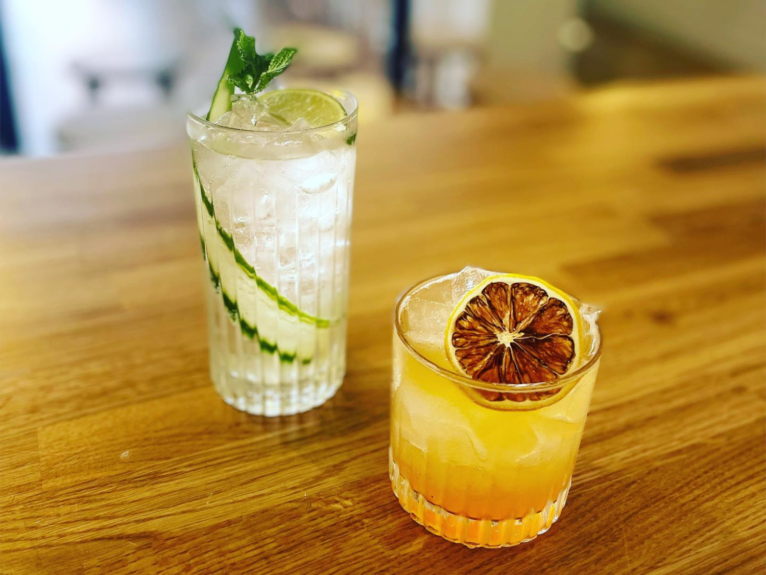 Two cocktails on a table at Vocation & Co