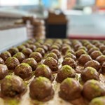 a close of the pistachio and chocolate ball dessert