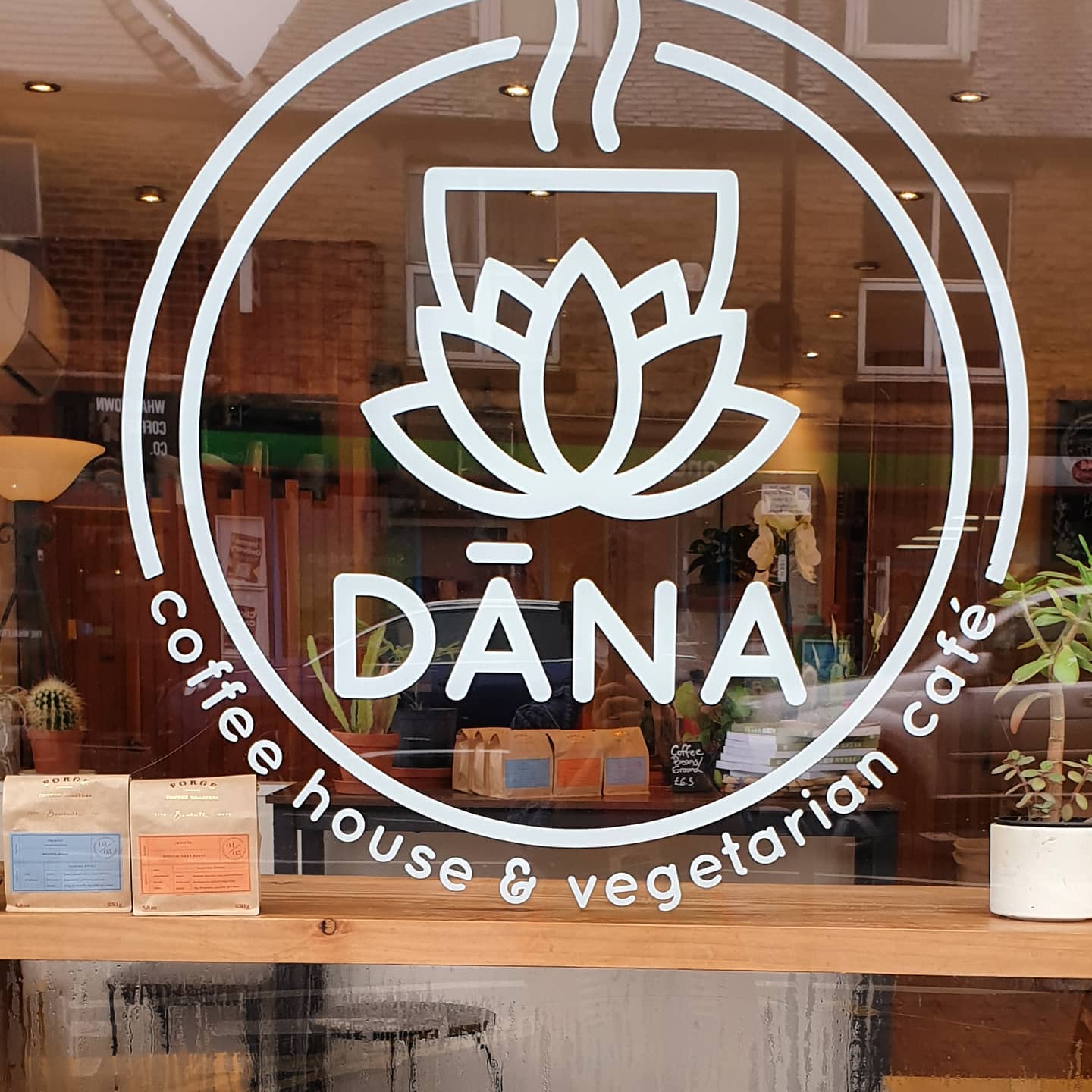 The window, with logo, at the Dana Cafe.