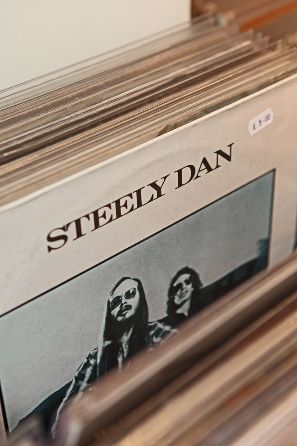 A rack of records, with a Steely Dan album at the front.
