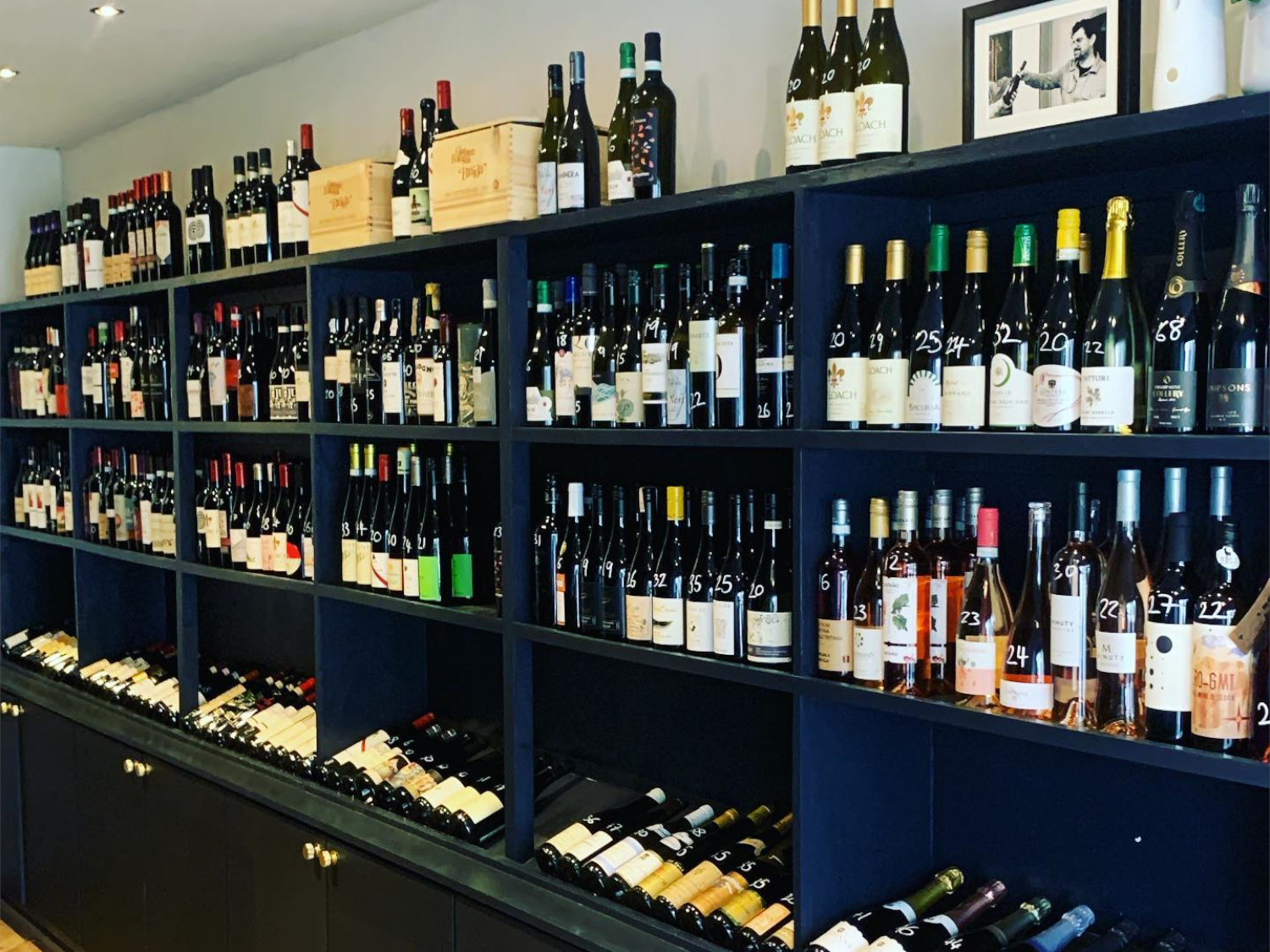 Shelves of wine bottle at Gills & Co.