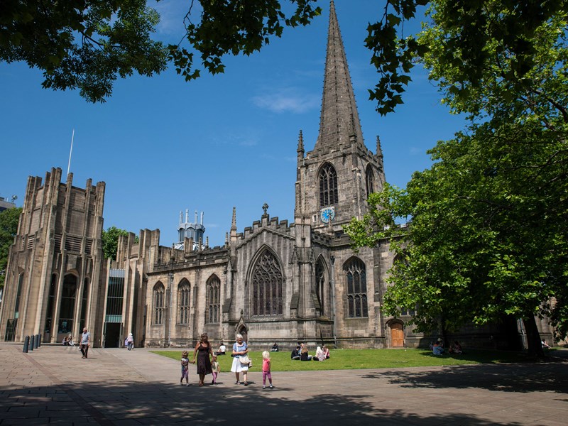 The exterior of Sheffield Cathedral on a bright sunny day.