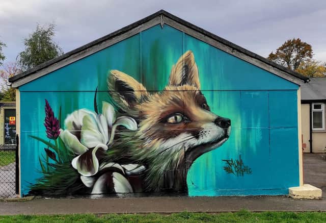 A mural of a fox by the street artist Faunagraphic.