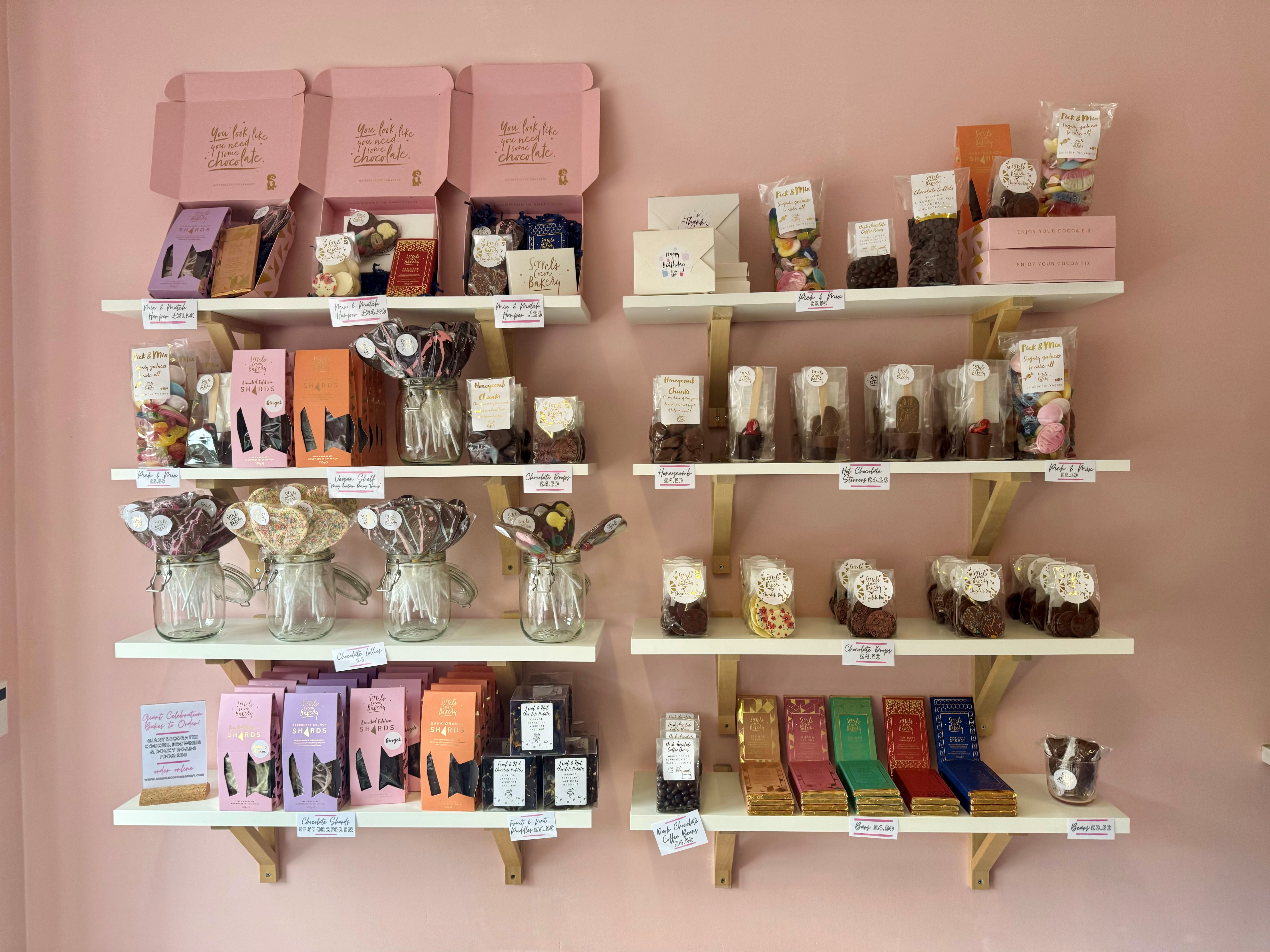 Shelving filled with various chocolates, lollies and treats for sale at Sorrel's Cocoa Bakery.
