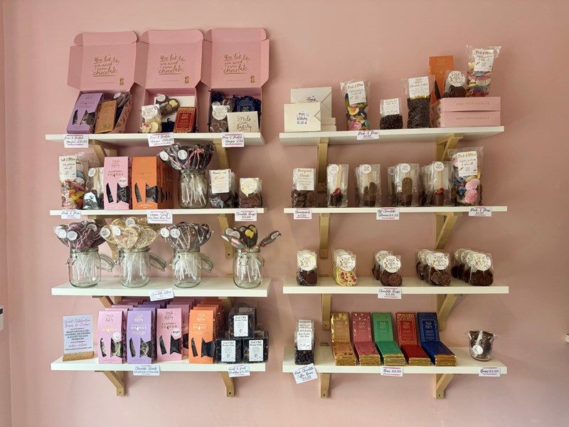 Shelving filled with various chocolates, lollies and treats for sale at Sorrel's Cocoa Bakery.