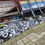 Exterior of Plot 22, which is decorated by several murals.