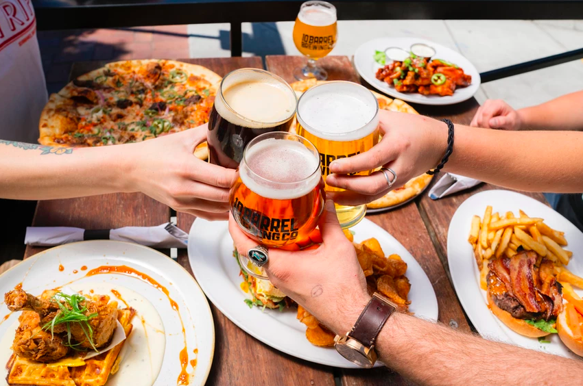 People enjoying a meal at Peaks Sports Bar & Snooker Club.