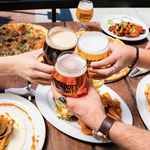 People enjoying a meal at Peaks Sports Bar & Snooker Club.