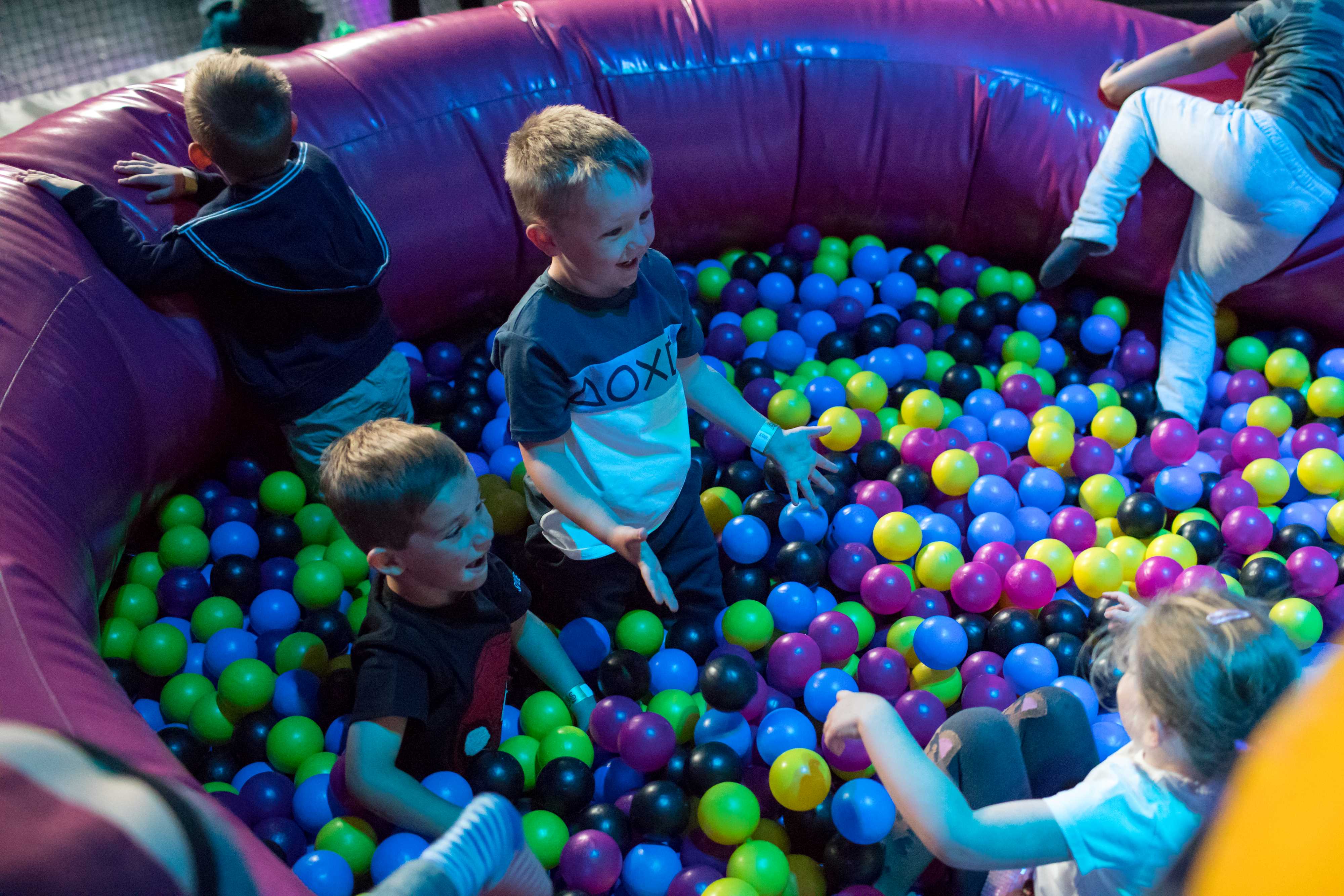 hildren playing in a ball pool.