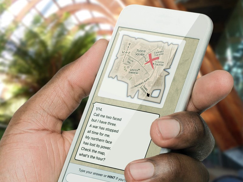 A close of a hand holding a phone.