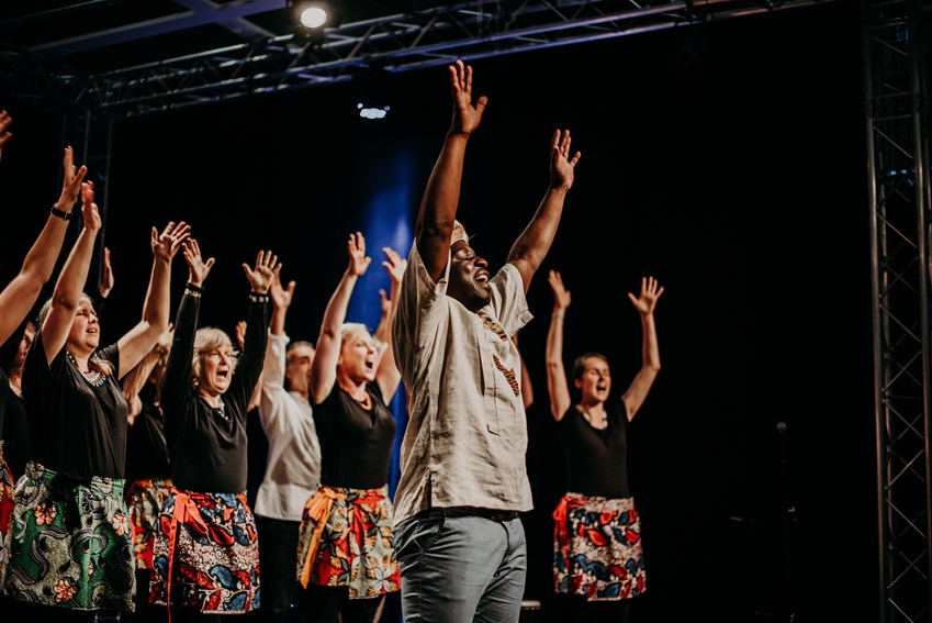 Crowds enjoy a performance at Migration Matters festival 2019