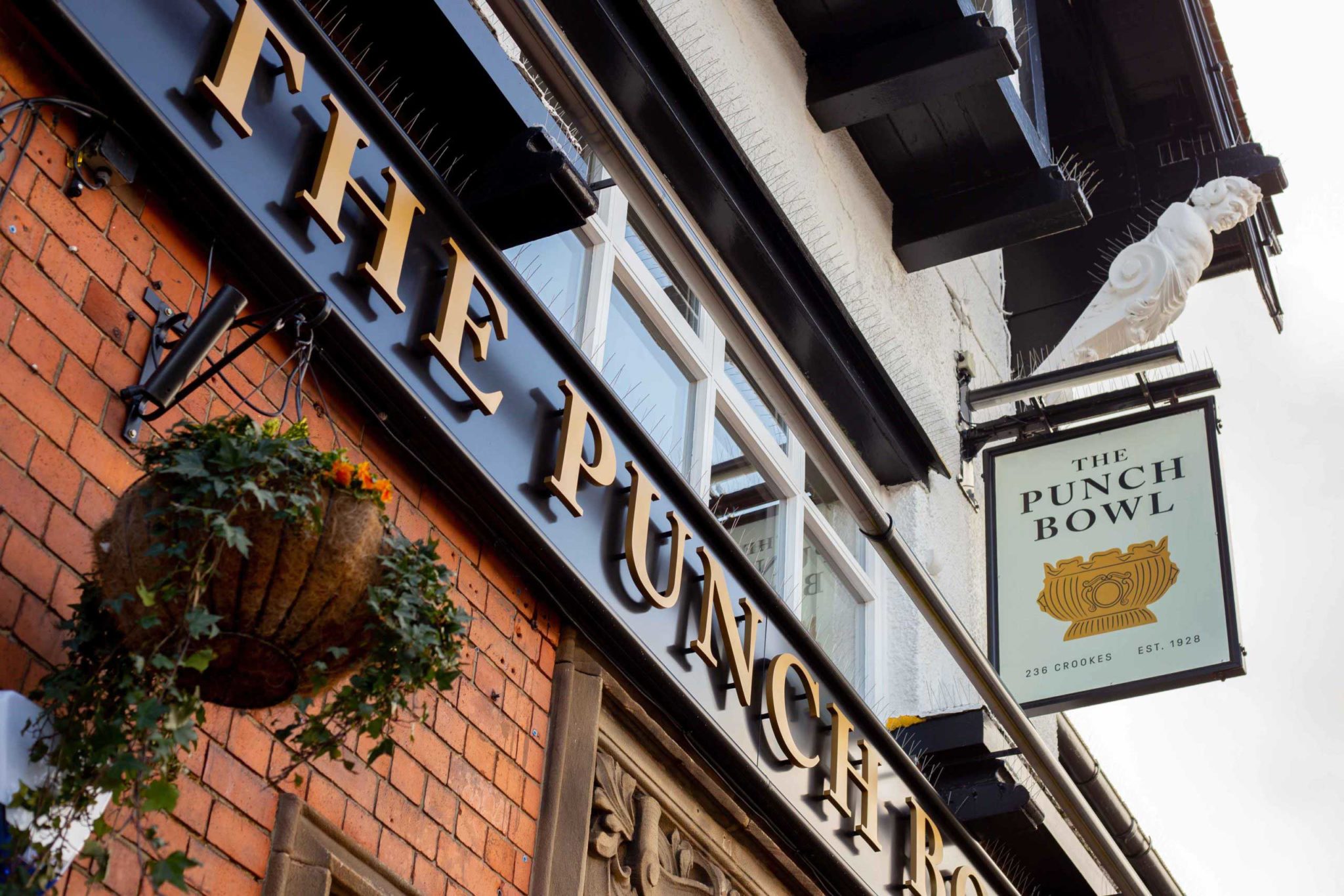 The pub sign for The Punch Bowl.