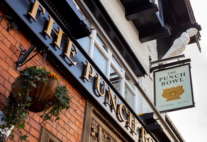 The pub sign for The Punch Bowl.
