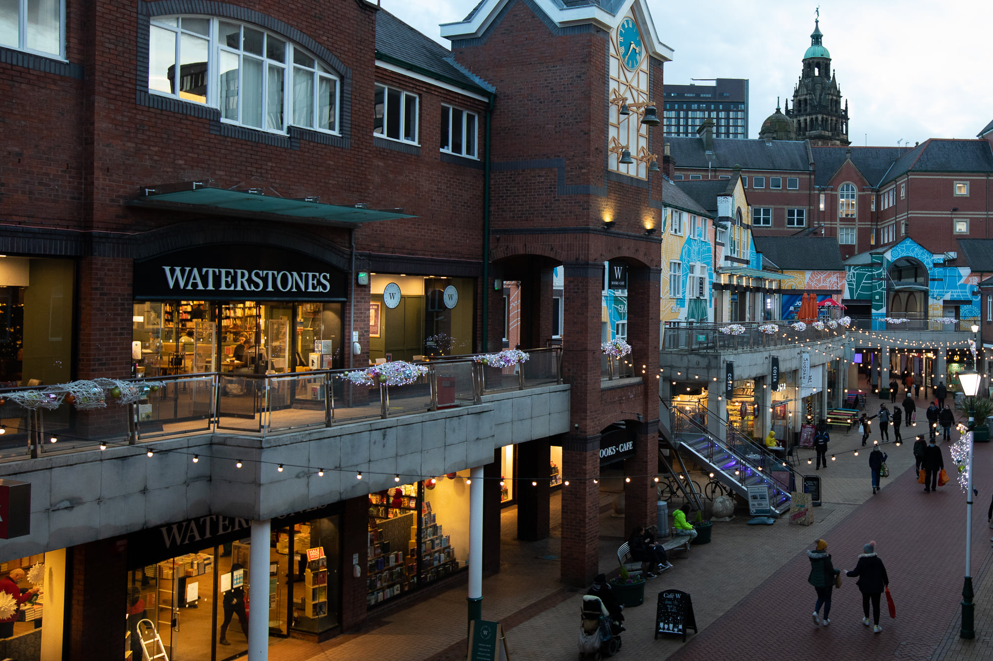 The exterior of Waterstones at dusk.