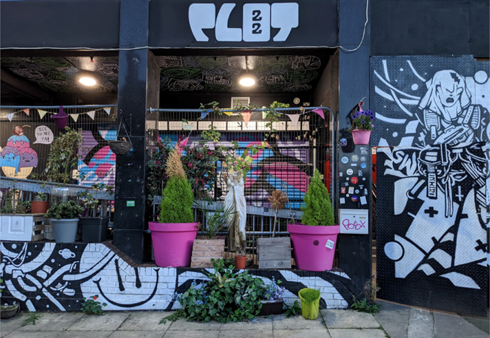 Exterior of Plot 22, which is decorated by several murals.