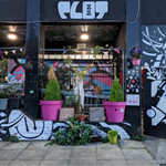 Exterior of Plot 22, which is decorated by several murals.