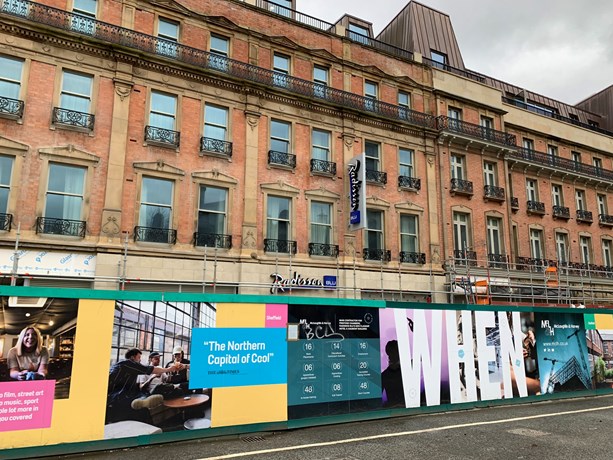 Hoardings outside the new Radisson Blu hotel