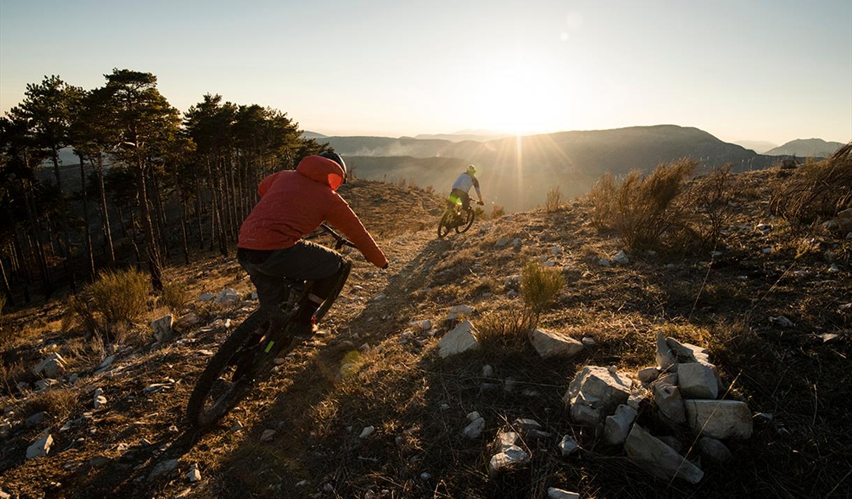Two people riding mountain bikes at Fox Valley.
