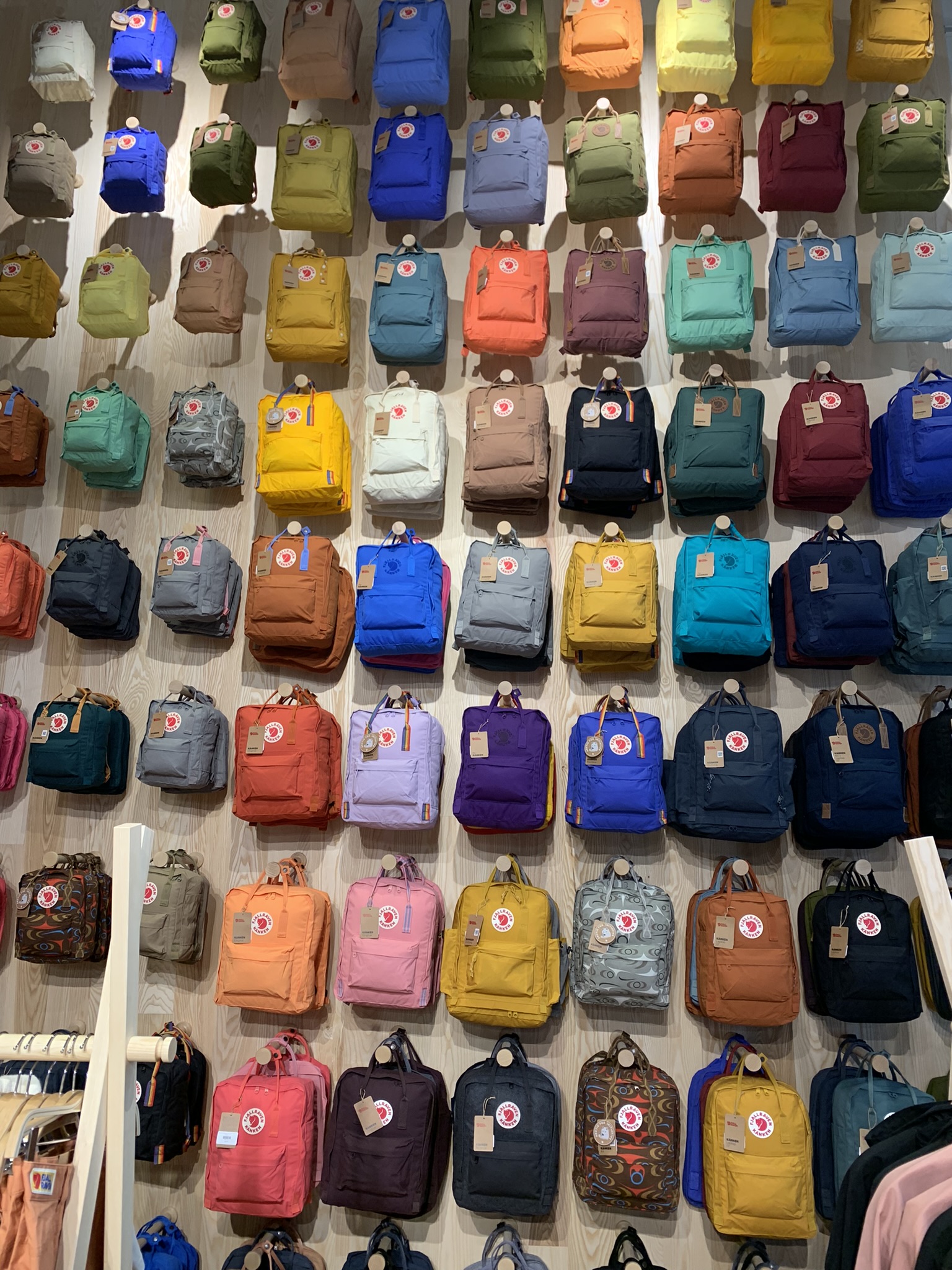 A huge wall display of Kånken bags at the Fjallraven store in Sheffield.