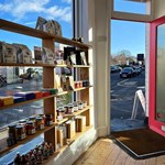 Shelves packed with goods at the Corner Store.