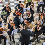 The Sheffield Philharmonic Orchestra playing live.
