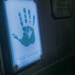 A palm reader on a wall at The Great Escape Game.