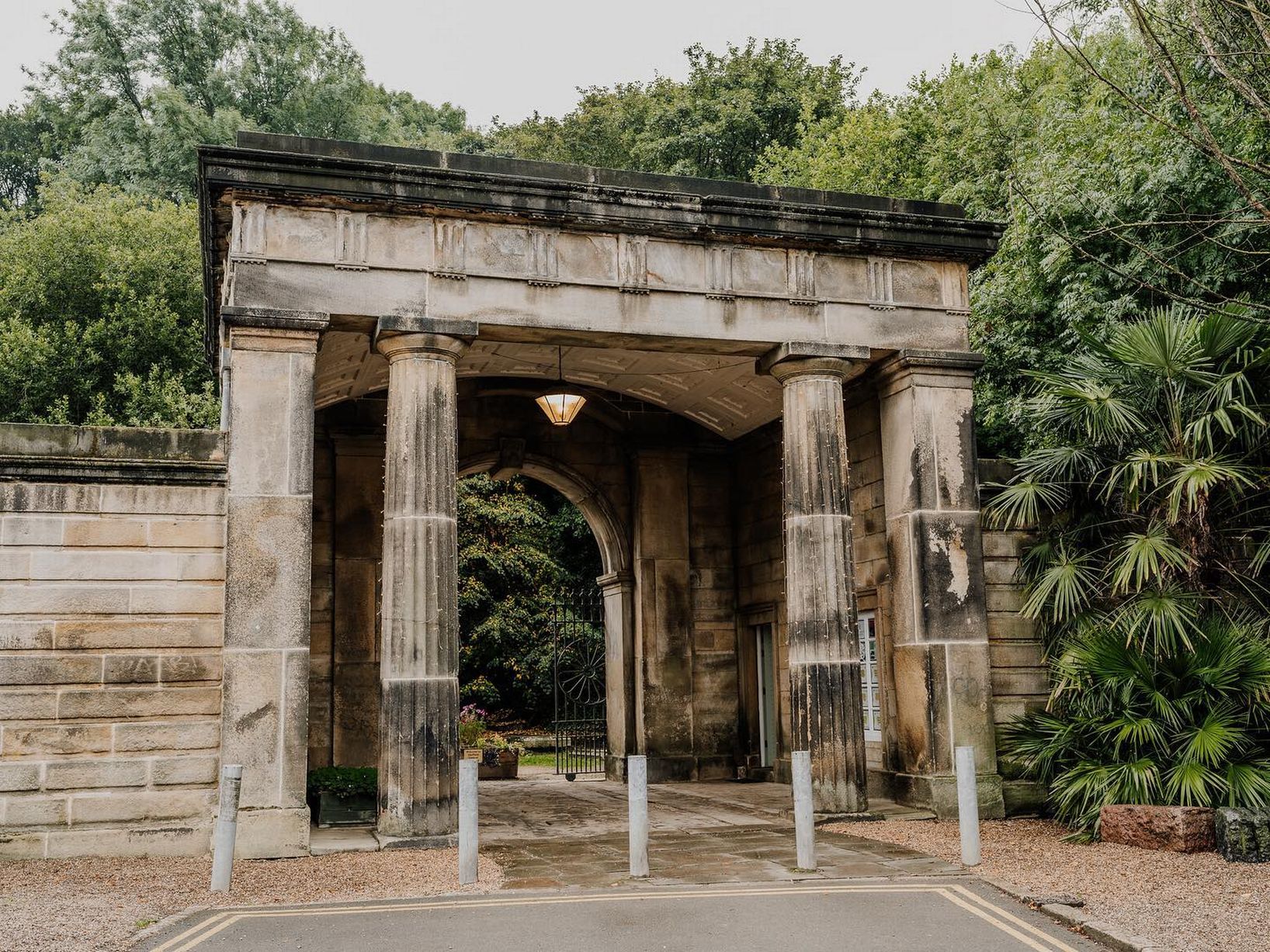 Entrance to a cemetery with stone pillars