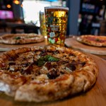 Pizza and beer at Boom Battle Bar.