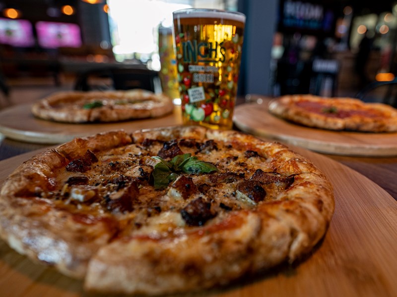 Pizza and beer at Boom Battle Bar.