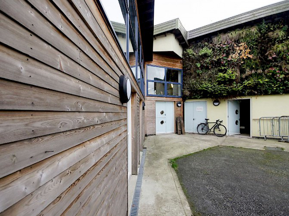 The exterior of Manor Oaks Studios.