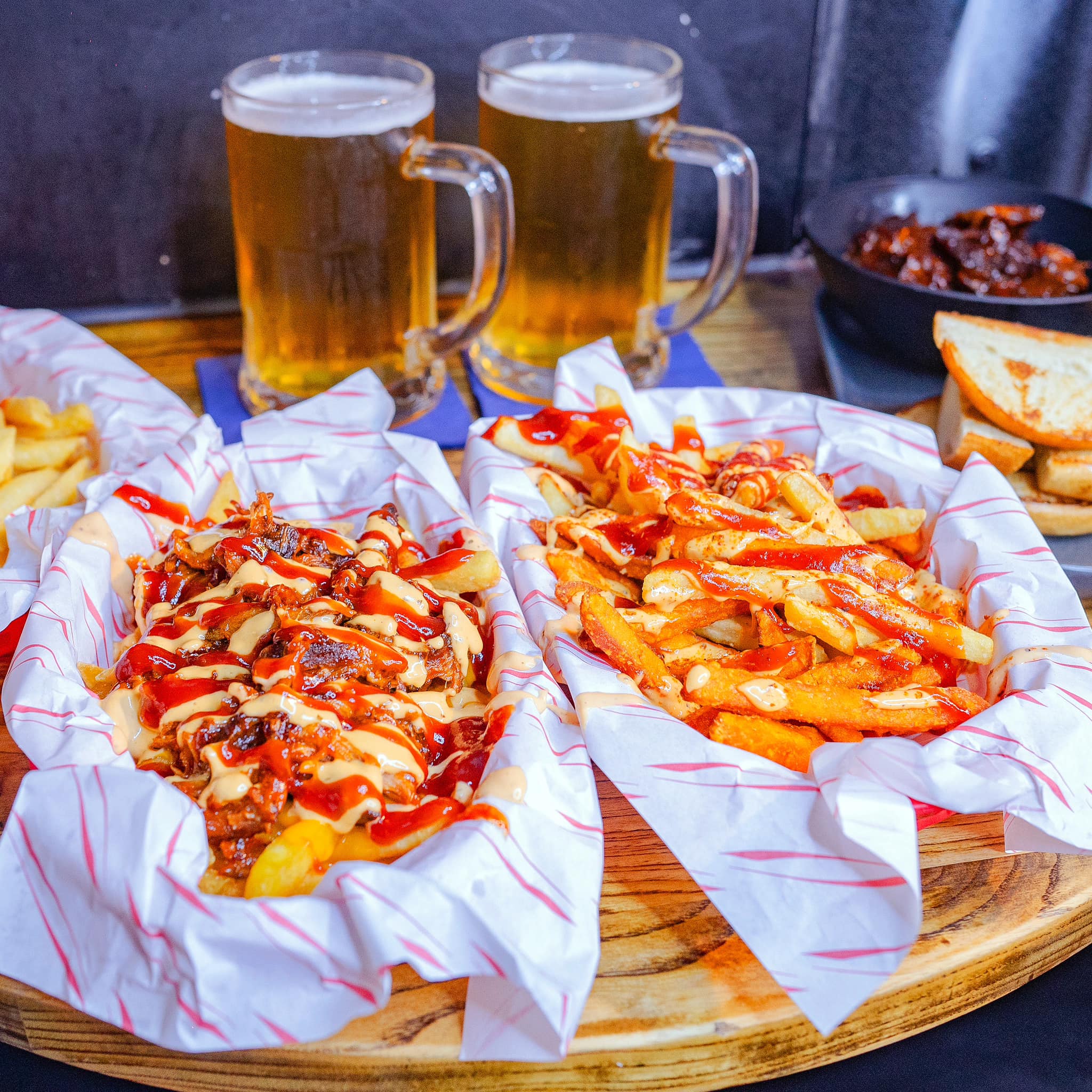 Beer and dirty fries at FirePit Rocks Bar and BBQ.