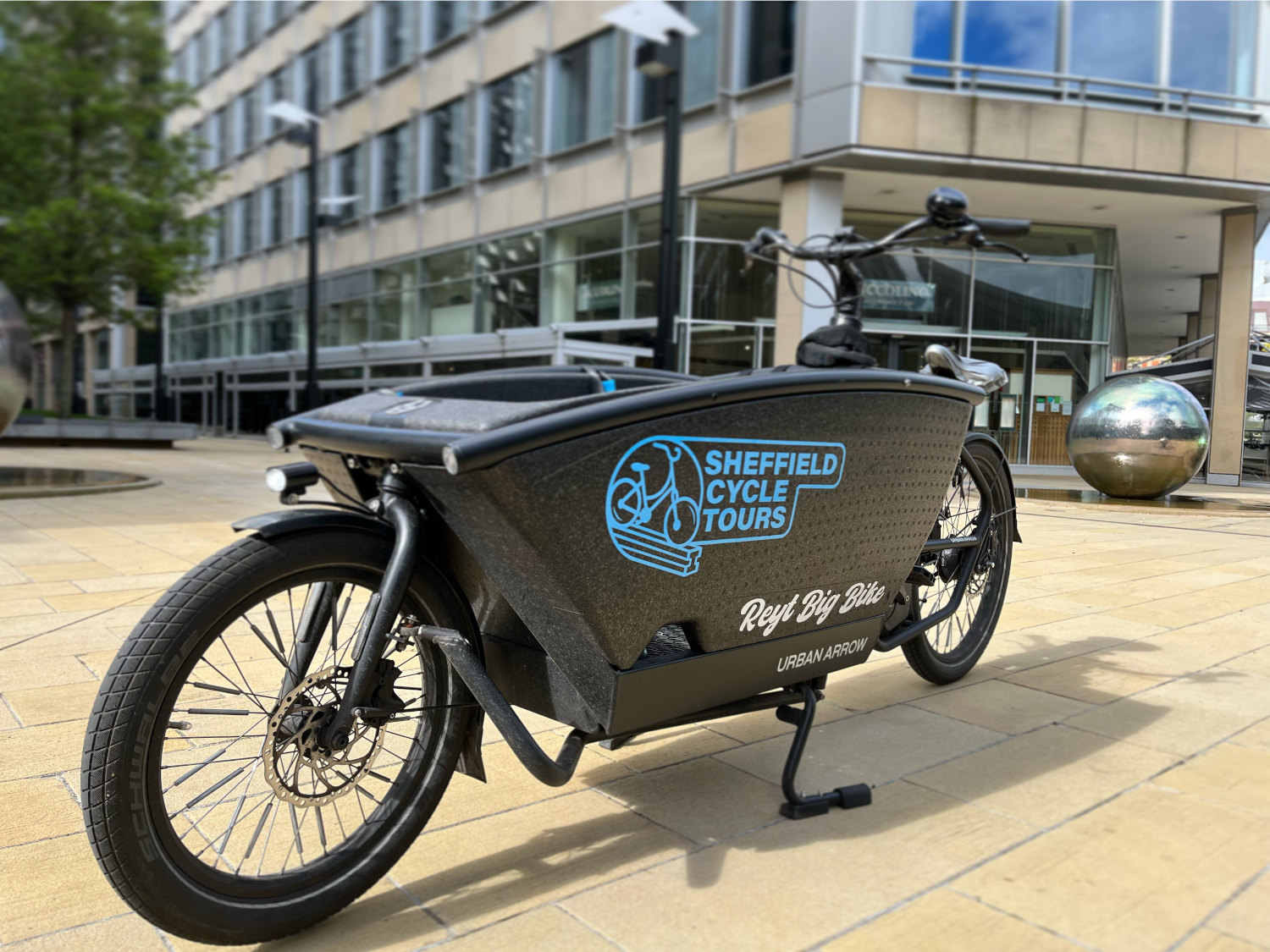 The Sheffield Cycle Tours special bike that has a pod, positioned in front of the rider, where a passenger can sit.