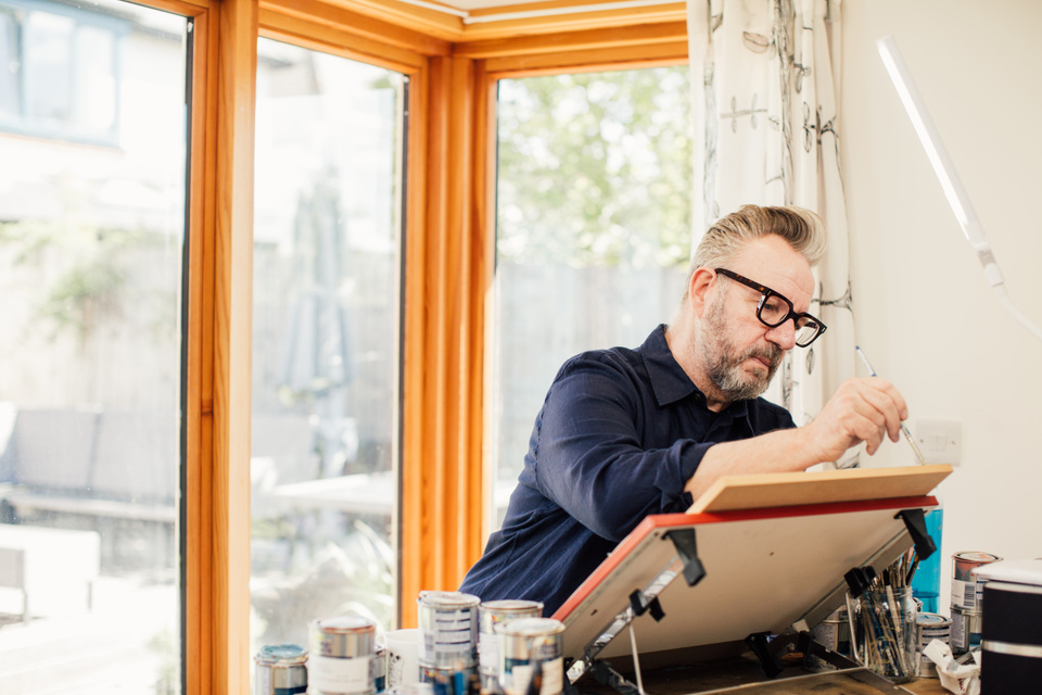 Pete Mckee at work on an easel. 