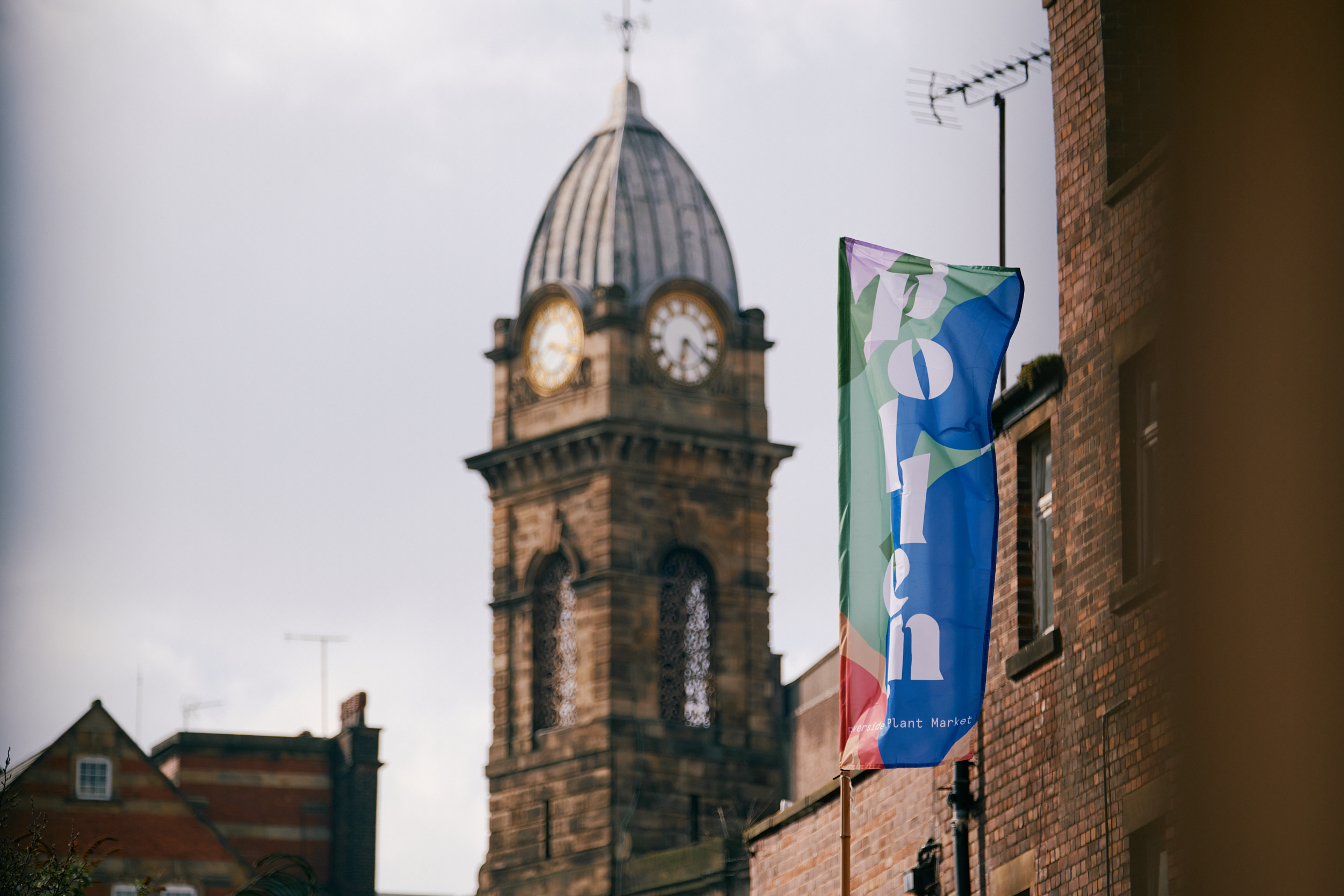 A Pollen Market flag flutters in the breeze.