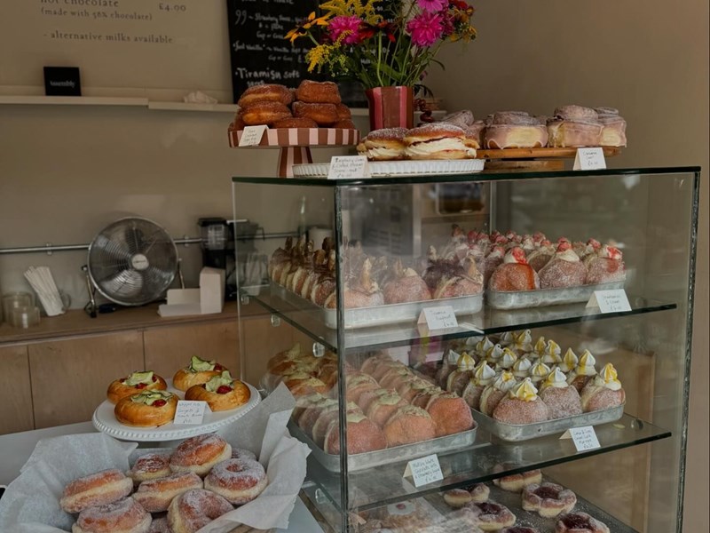 A glass case filled with baked goodies at Eve Kitchen.