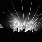 People dancing at a concert.