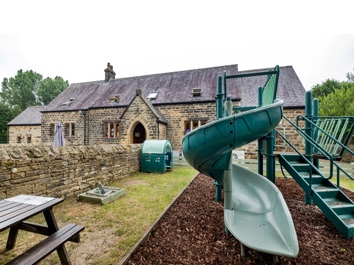 A children's outdoor play area at The Schoolrooms.