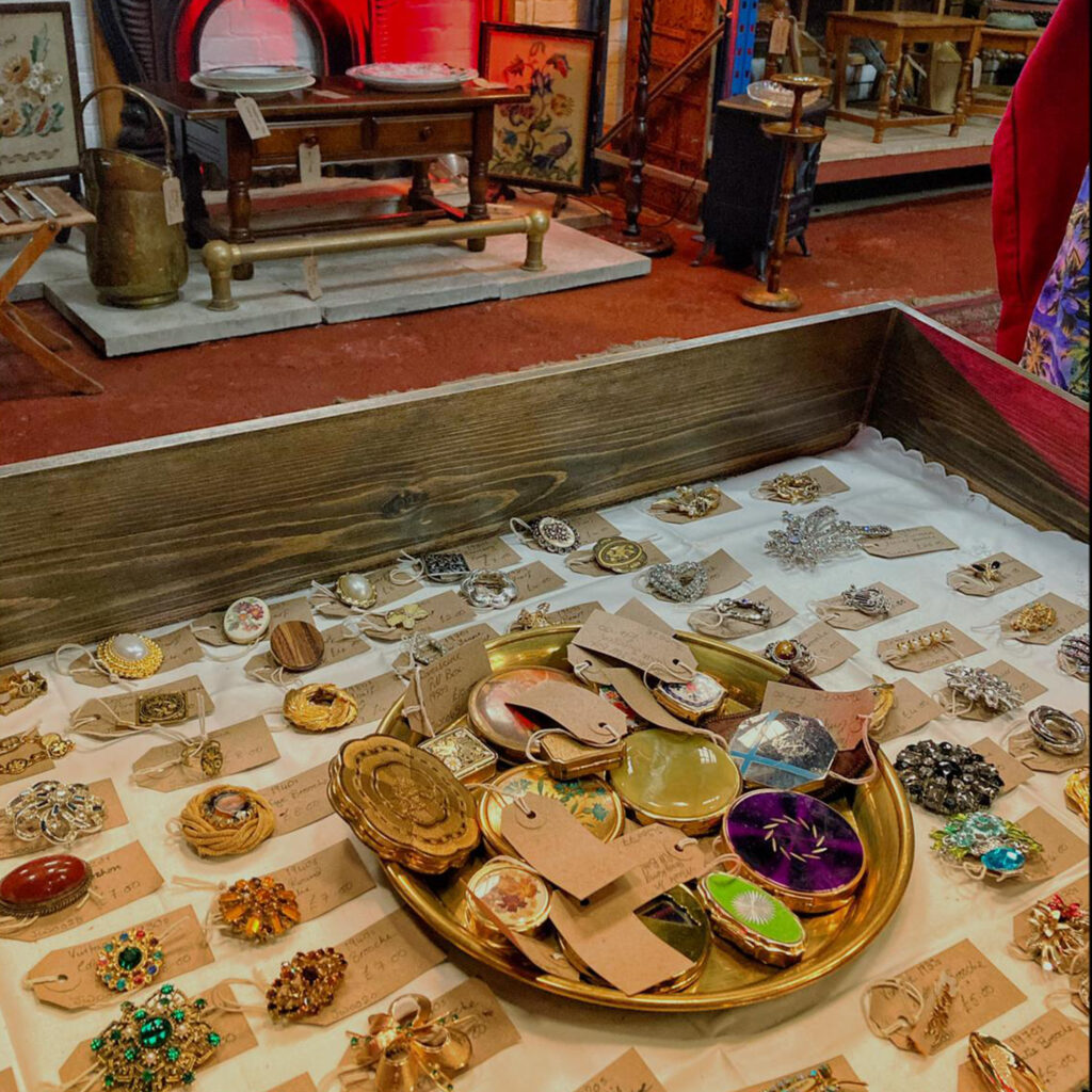 A display cabinet full of vintage second-hand jewellery for sale at The WareHouse.