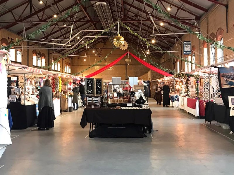 The upper hall at Kelham Island Museum with stalls and festive decorations